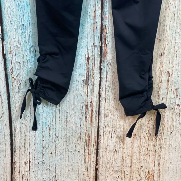 FREE PEOPLE NWOT Black Swerve Tie Ankle Leggings - Picture 15 of 16